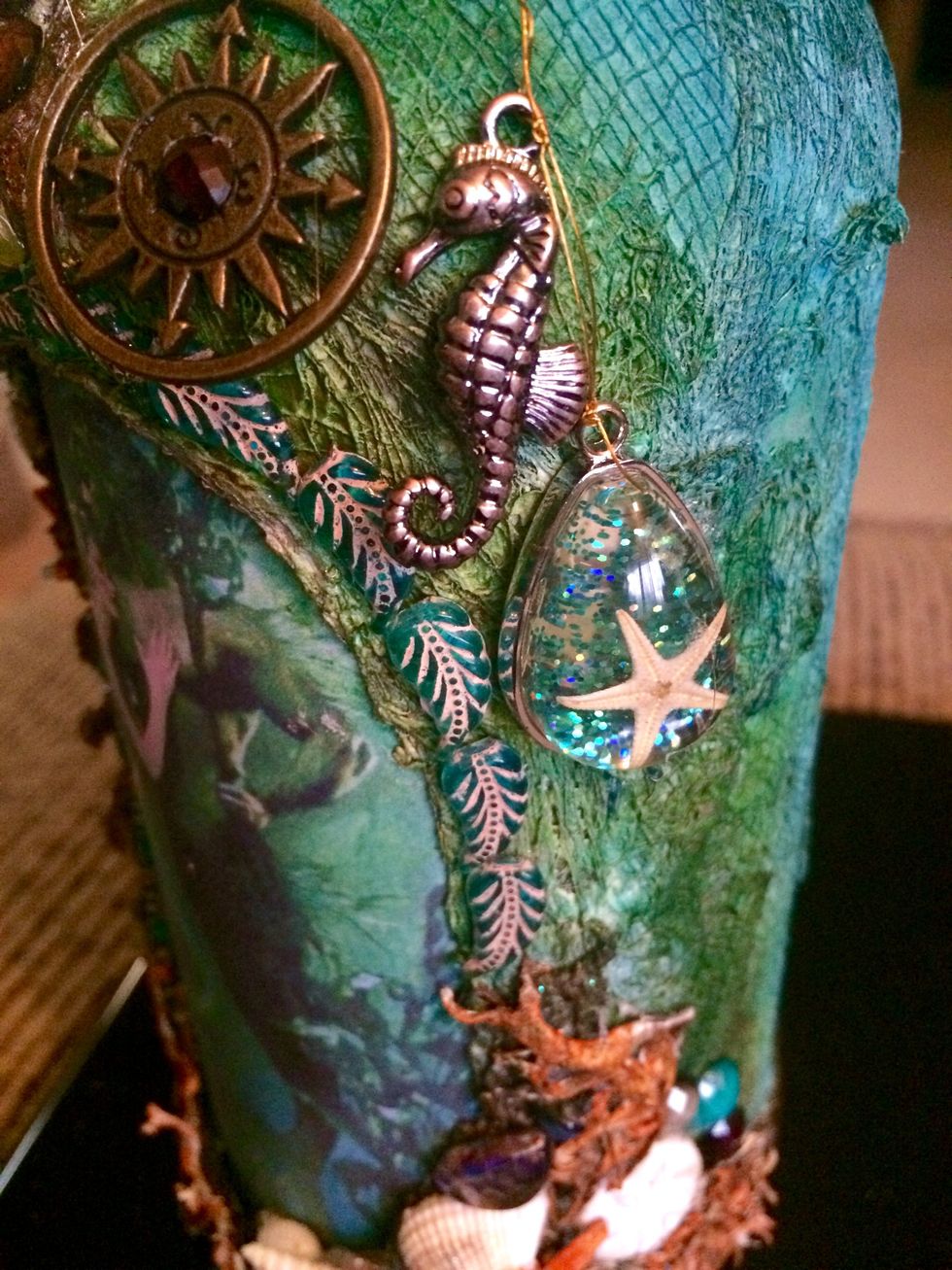 These leaf beads are super cool and they came in the large package of beads I picked up at Walmart. They really worked nicely as a frame around the image.