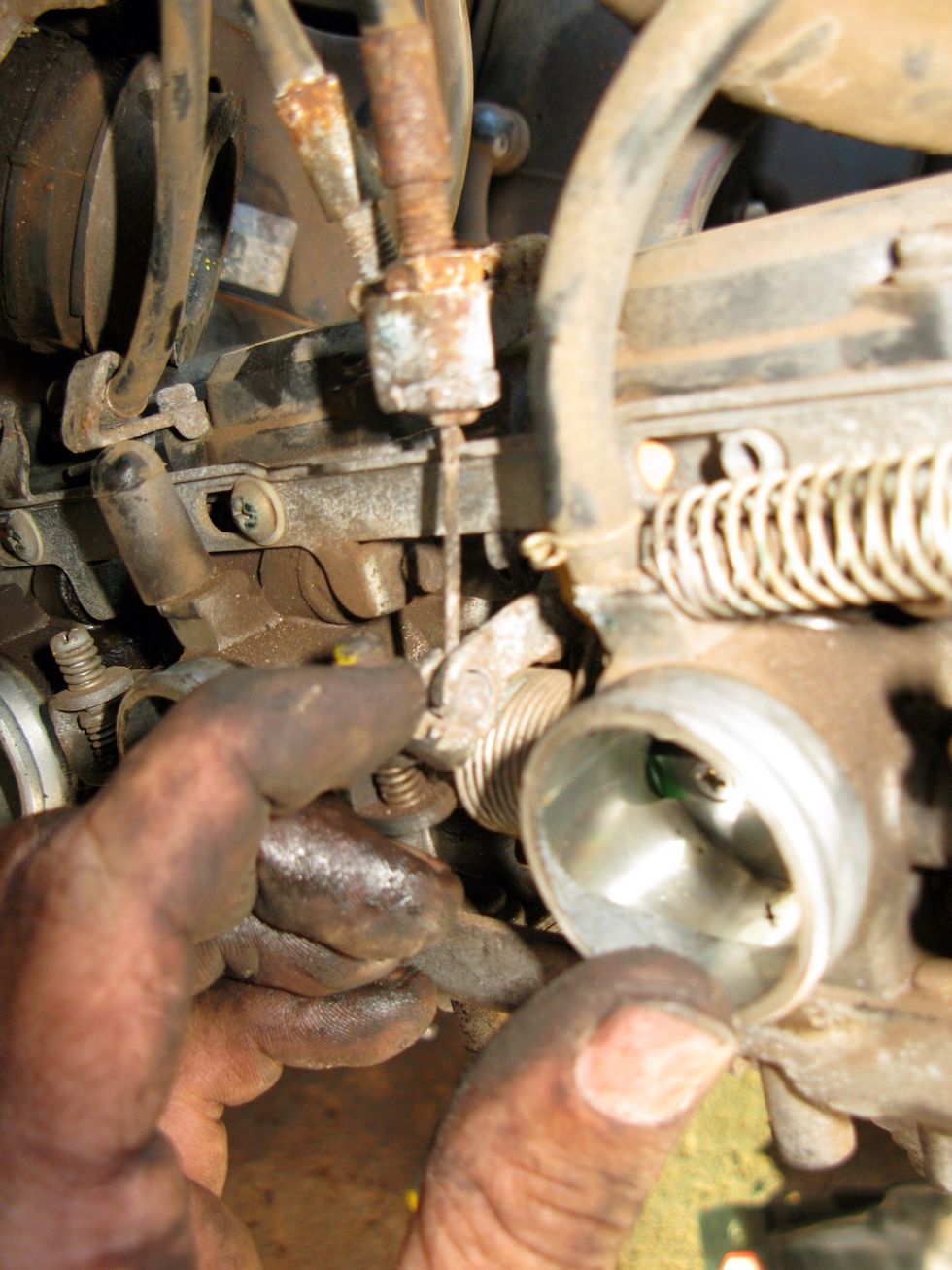 These ones were a pain. They are the throttle cables and there are two. One to remove the fuel when you let go and the other to add it when you accelerate.