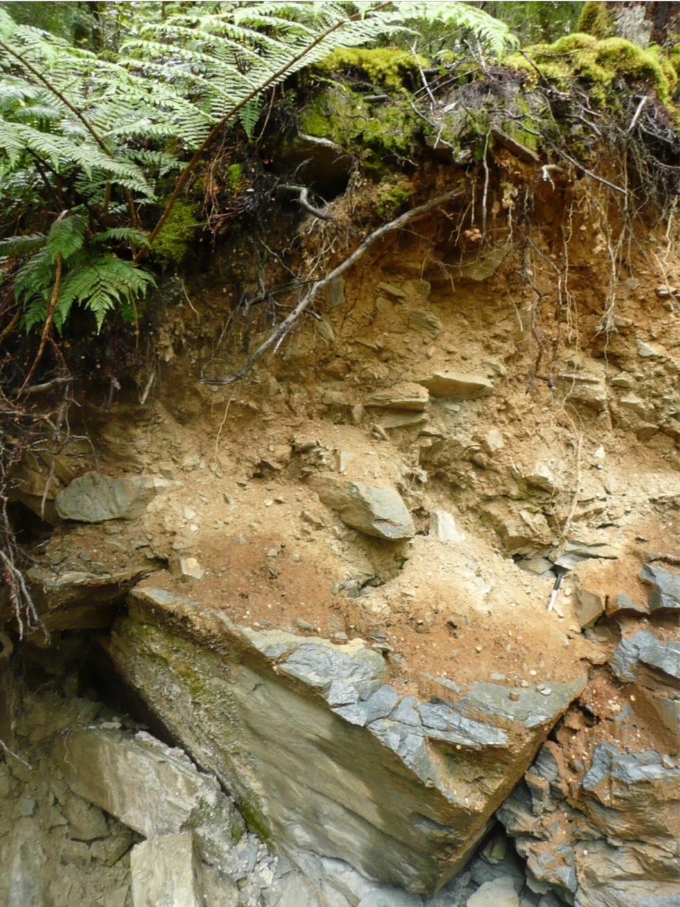 These rocks are being weathered down and breaking down. From the rain and the wind. When people come such as scientist come and break down each rock. This then speeds up the process.