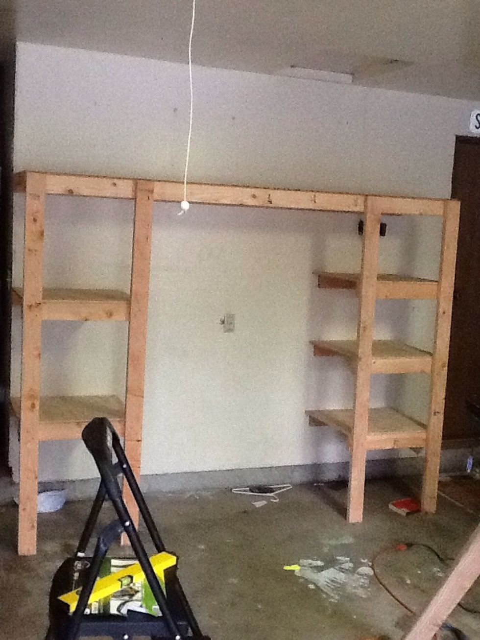 These shelves are so easy to build, and are a quarter of the cost of other garage shelving units. I was able to build two of these shelves in the garage for right around $100 total.