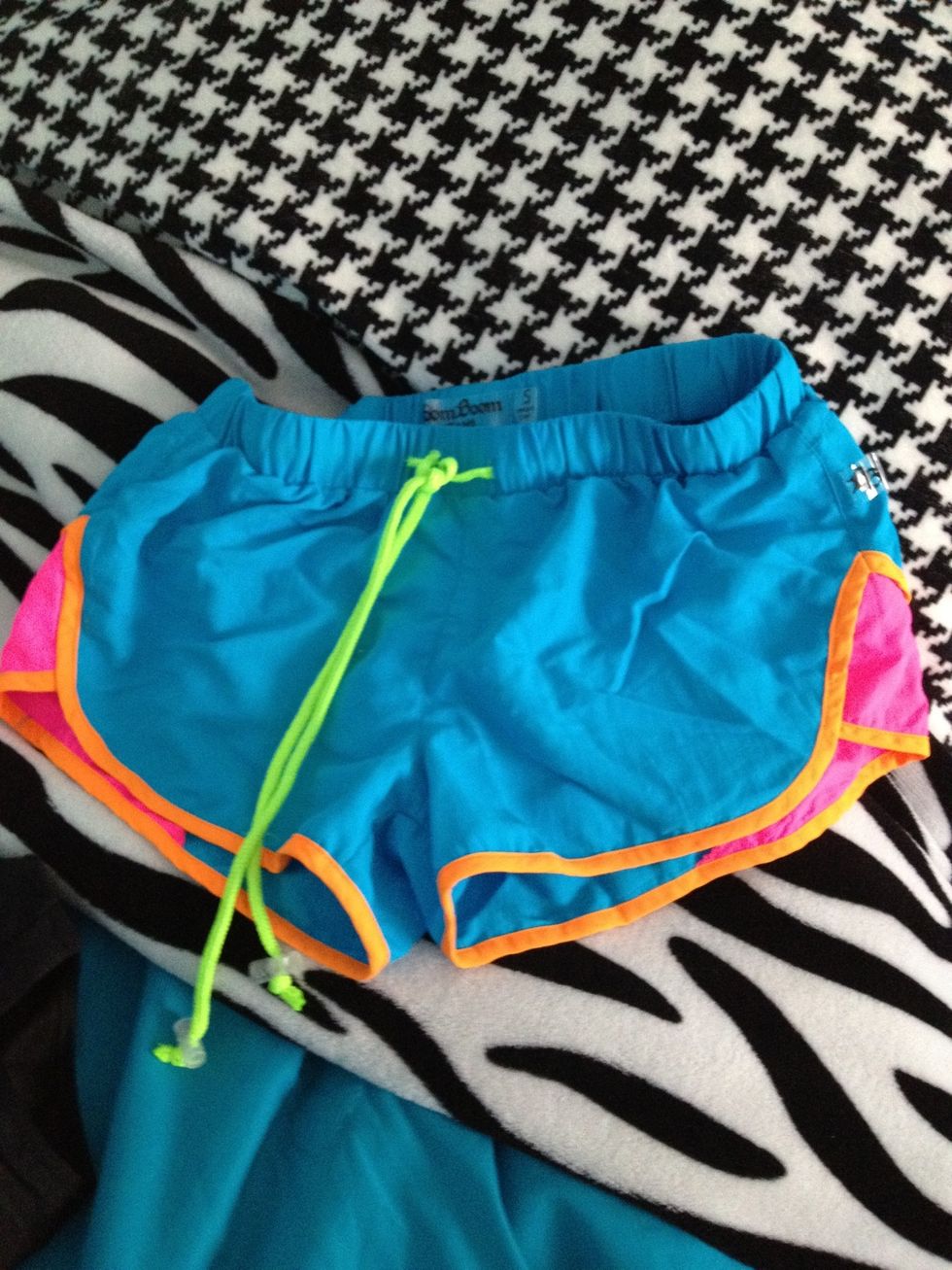 these shorts are one of my favorites to wear over a swim suit. they dry super quickly and are really comfortable. and hey! who doesn't love colorful shorts!?(: