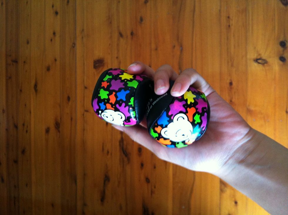 These two balls is just about the perfect size for my hand they need to be able to comfortably fit 2 in to a hand
