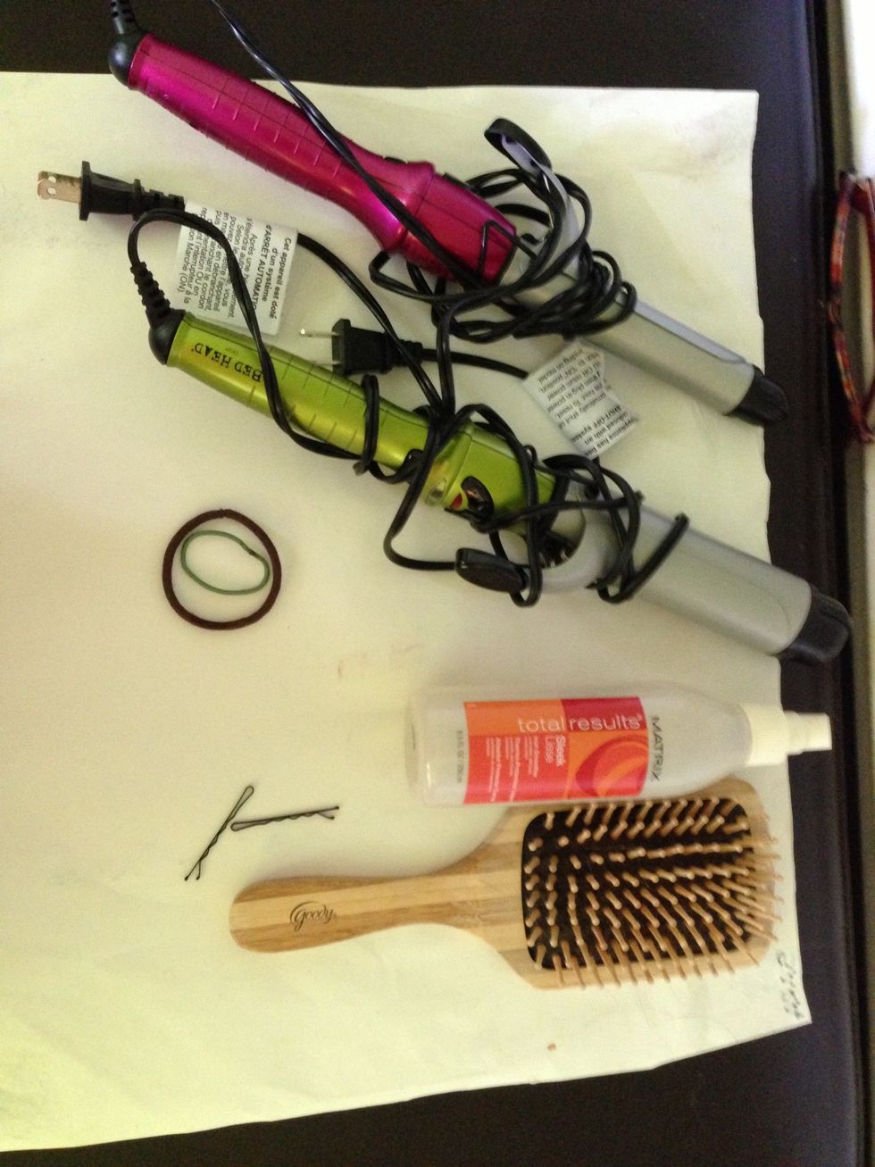 These will be the supplies needed: A brush, couple of bobby pins, couple of hair ties heat protectant, and a curling iron (just one).