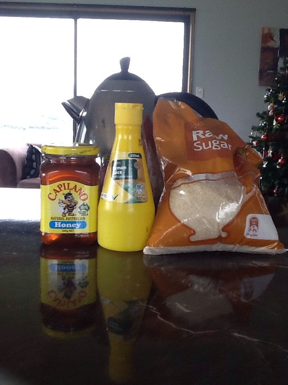 These will be your ingredients. I didn't have a real lemon at the moment but you can use the juice but the real lemon is the best. The ingredients are to your taste but the lemon and honey cure.