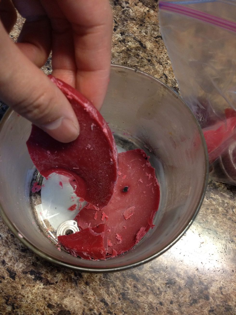 They come off easily! Trash or save the bits and pieces of candle wax for later use in a candle burner if you like.