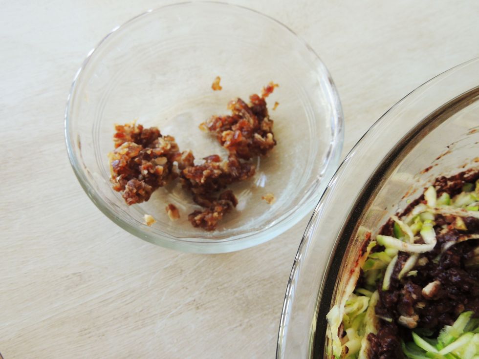 They will stick together.  You'll need to separate and top the cake with some of these.  You can also add a chopped nut topping of your choice.