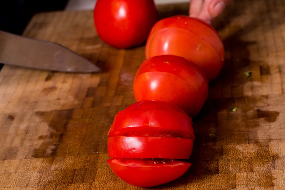 Thick slices with a sharp or serrated knife.