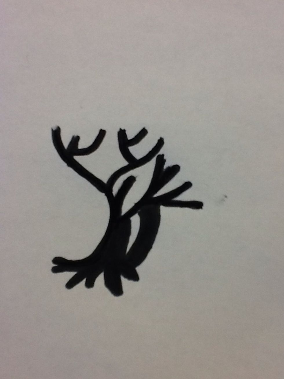 Thicken the trunk and make the roots of the tree. Leave a gap in the center of the trunk.