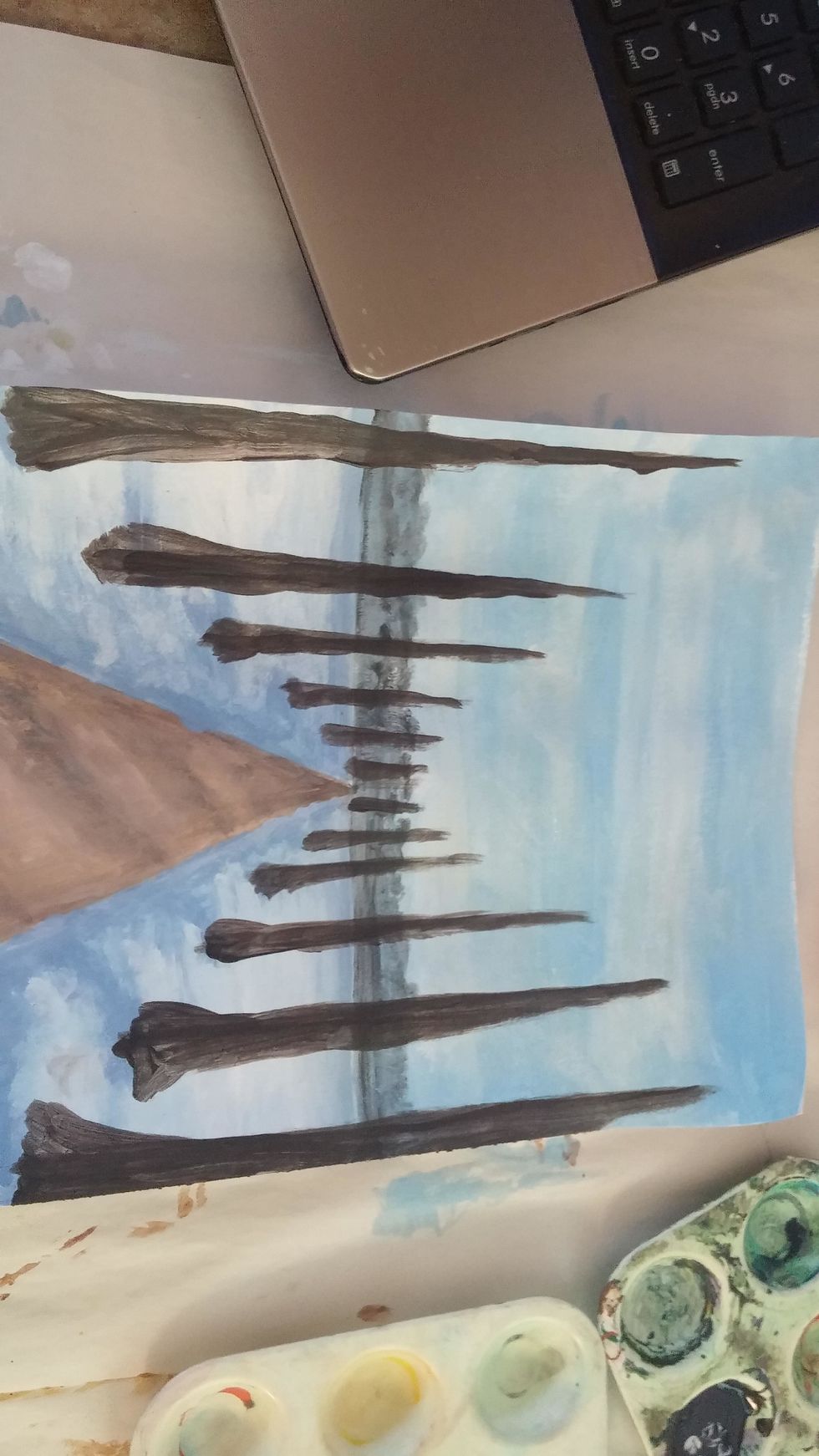 Thicken trunks and begin adding shadows with the shade and highlights in the direction of the light source with the tint,