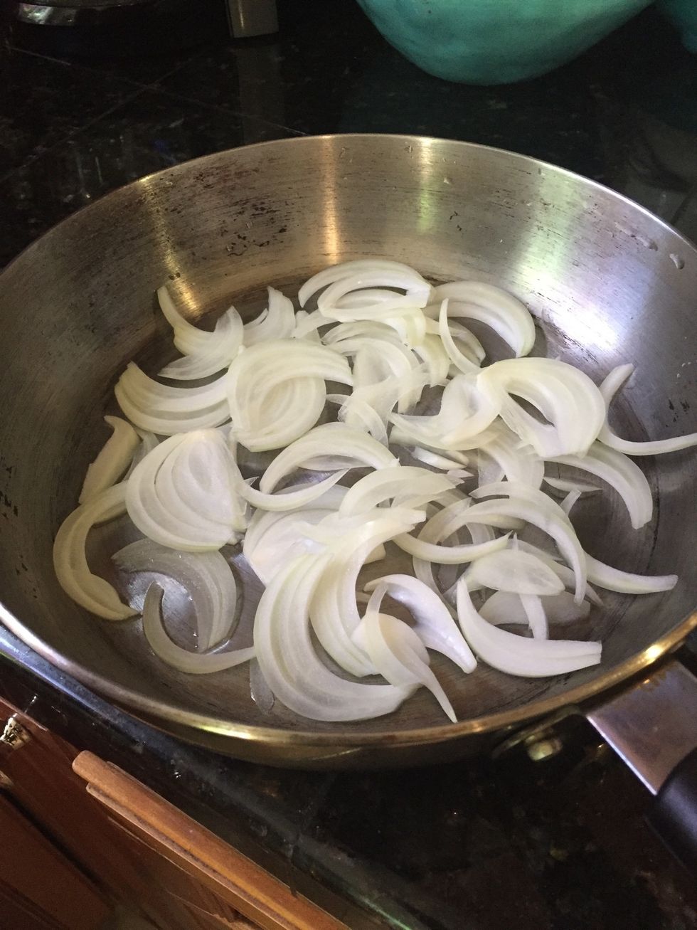 Thin slice onions, add to frying pan