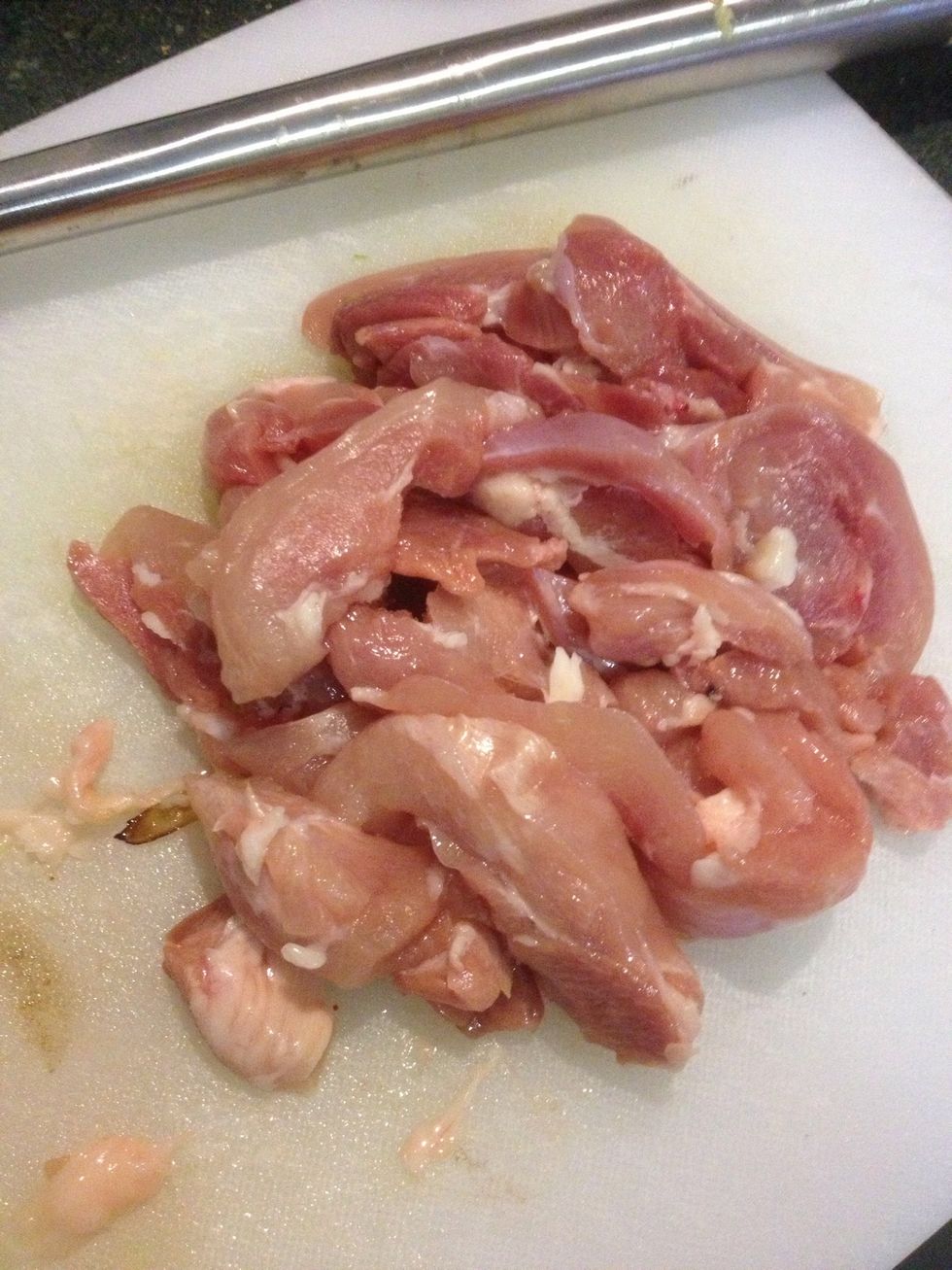 Thinly slice a single chicken breast.