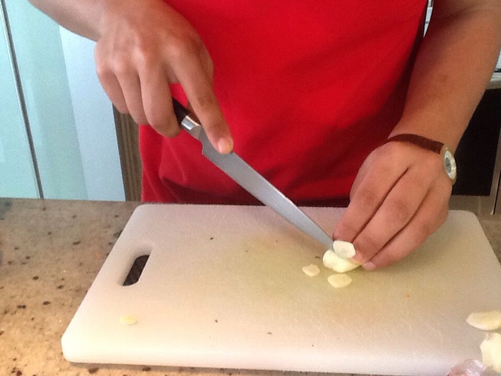 Thinly slice garlic