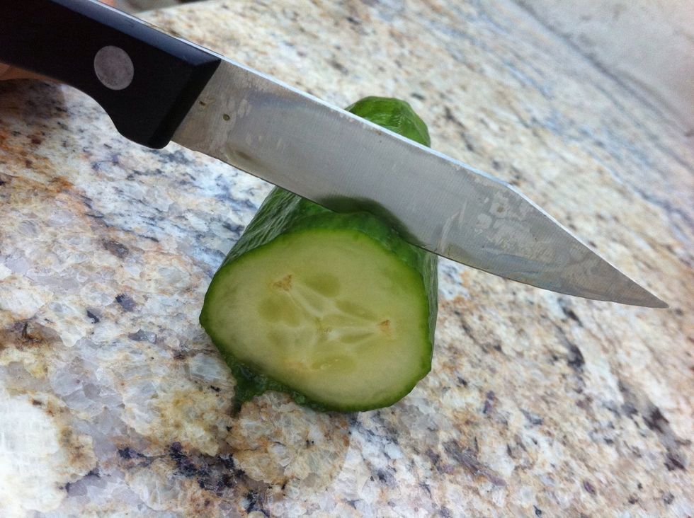 Thinly slice the cucumber...