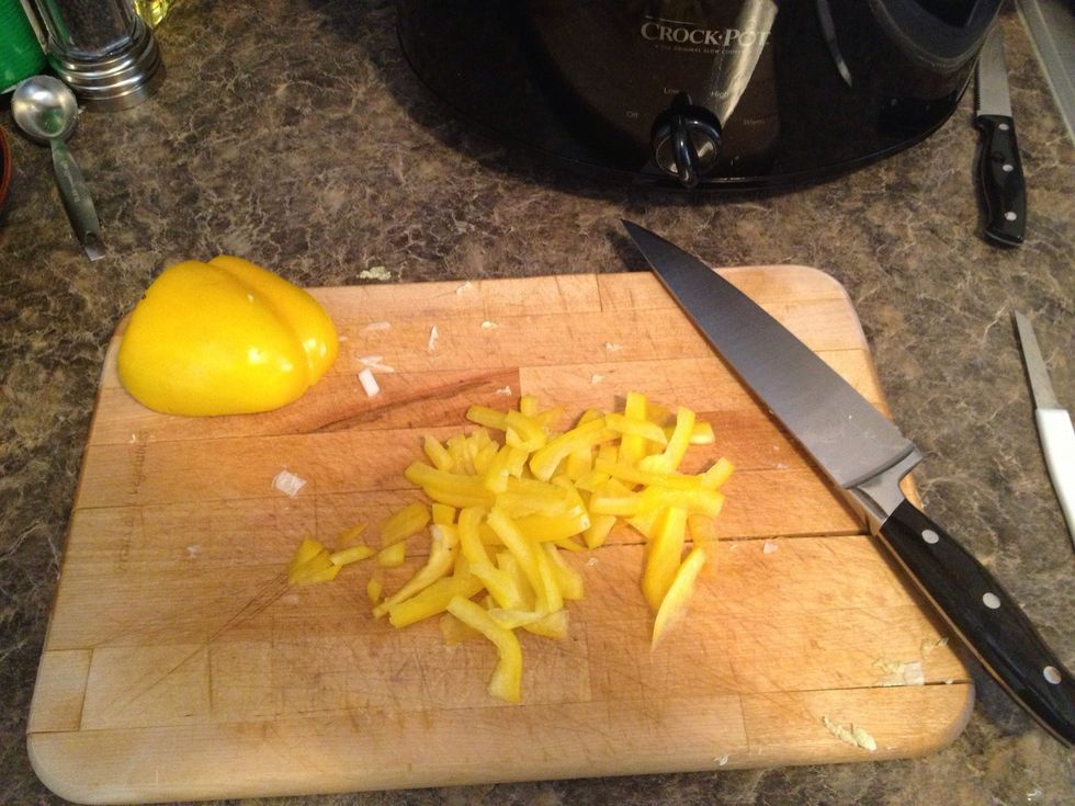 Thinly slice the pepper into bite size strips.