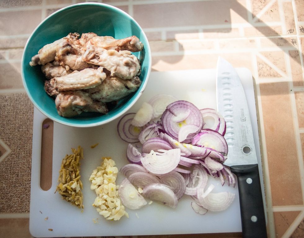 Thinly slice your onion as well as the ginger and garlic you boiled the meat with(you can also use fresh)