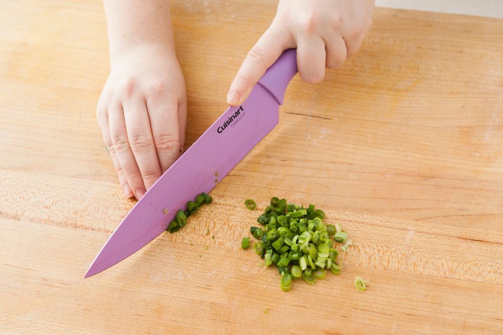 Thinly slice your scallions. Then, set aside.