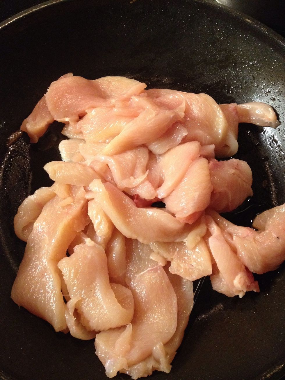 Thinly sliced the chicken breast and cook it without any seasoning.