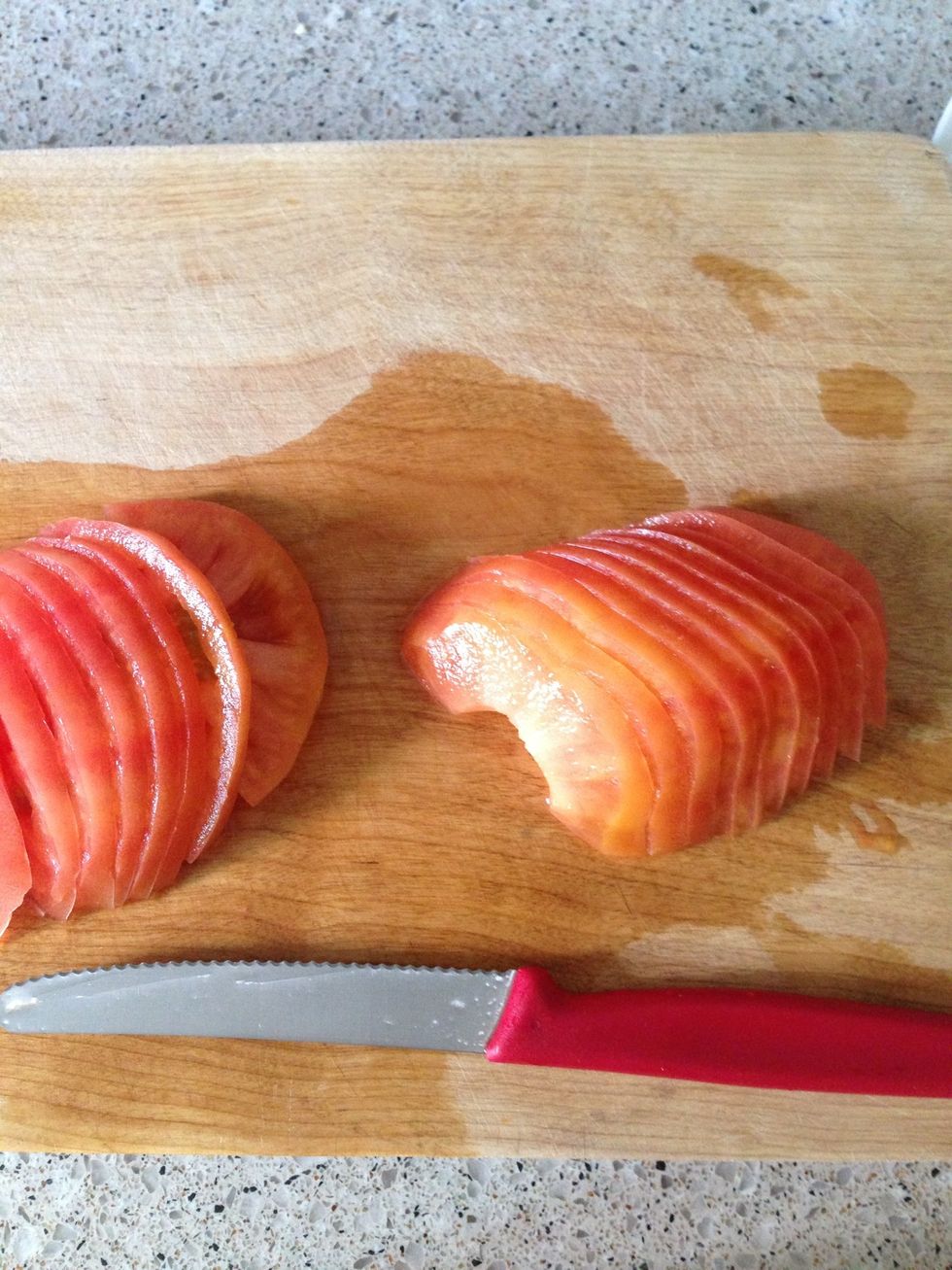 Thinly sliced tomato, 1/4 of big tomato=1/2 of small tomato= 1person portion
