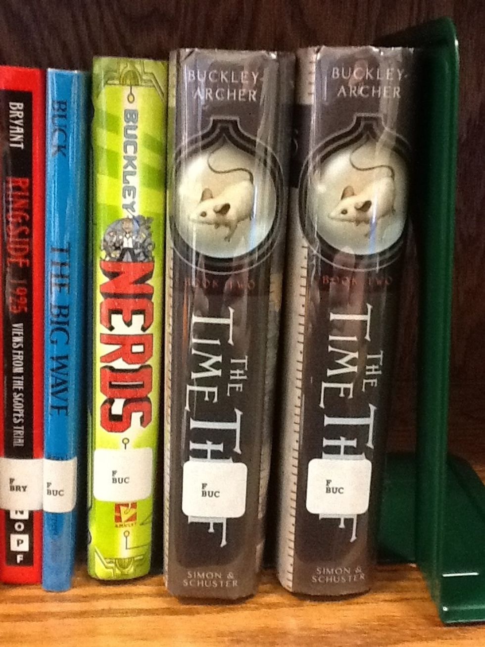 Third, find the book's place in that letter section by shelving alphabetically by the letters on the white label (the words "the", "a",  and "an" do not count).