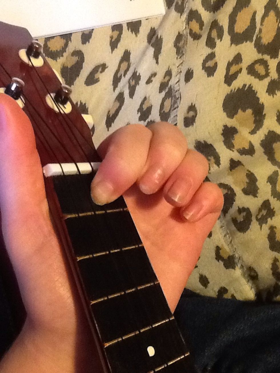 Third note - F (E string, first fret)