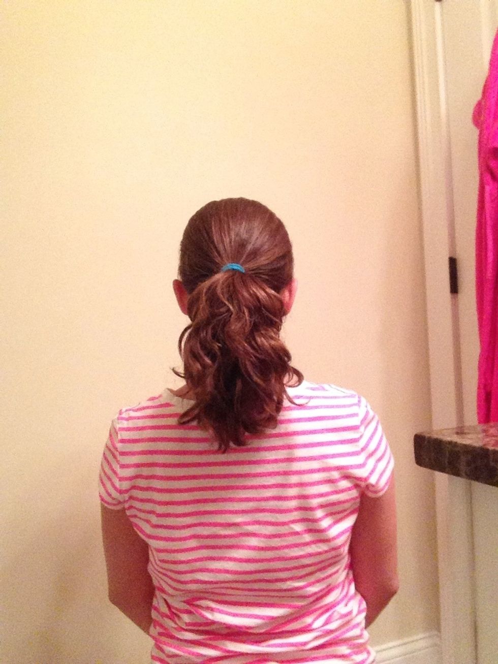 Third, put your hair in a ponytail in the middle of your head. You can put it higher, but it may be more uncomfortable to sleep in.