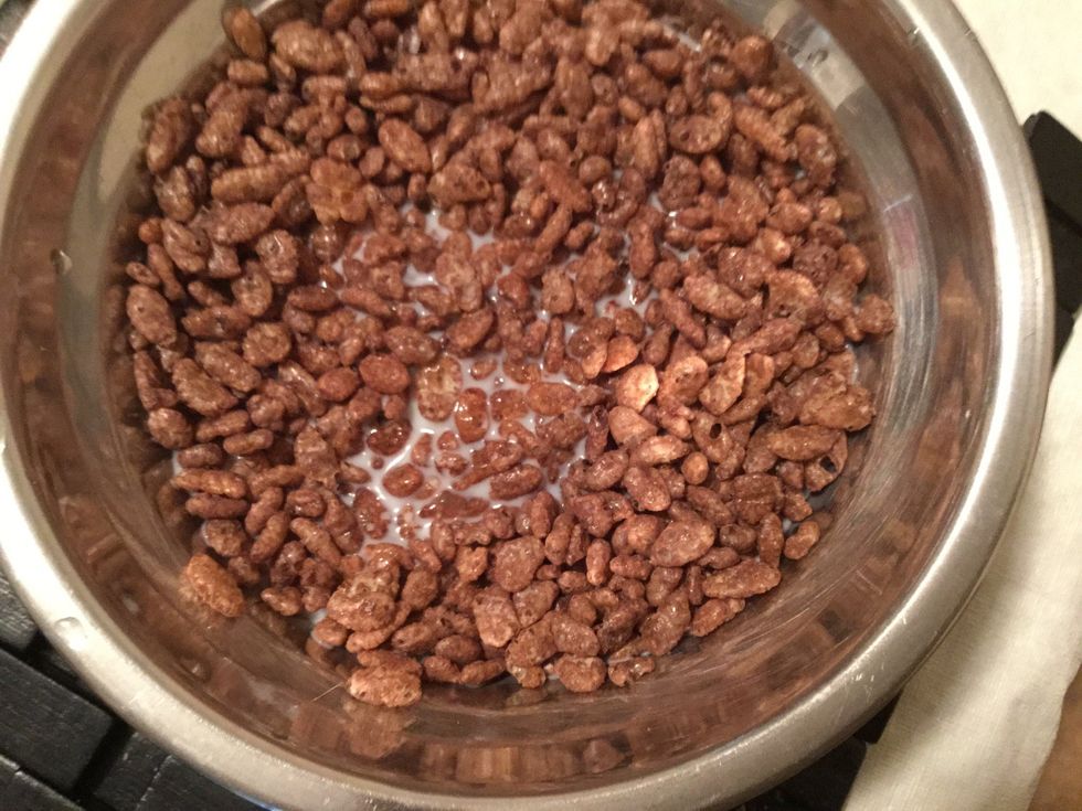 Thirdly, pour one cup of milk into the bowl.