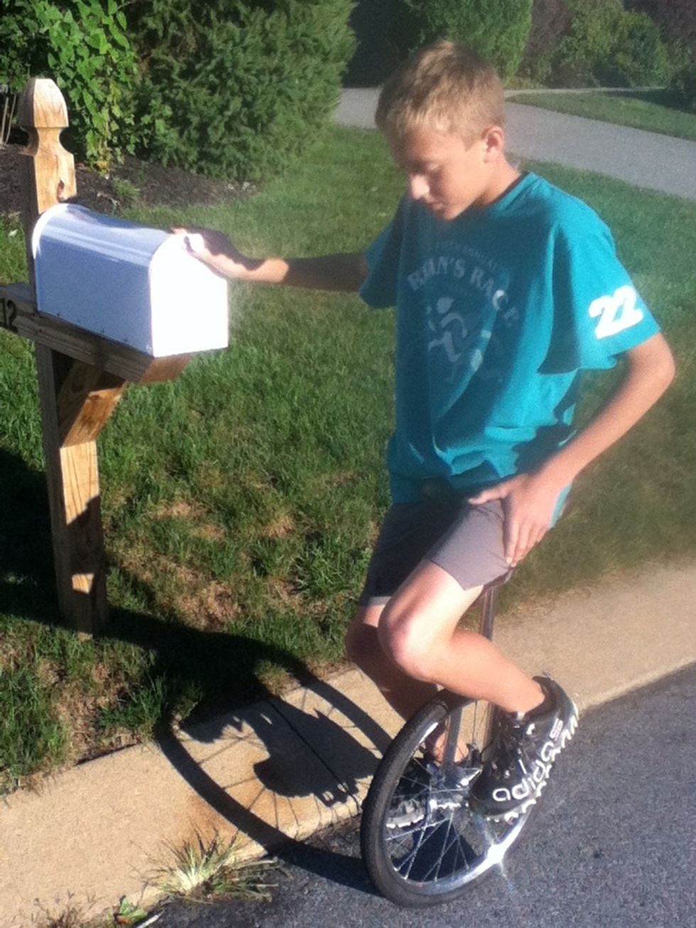 Thirdly, pull your lower pedal back and place your other foot on the higher pedal. It may take a little bit of practice to keep your balance.