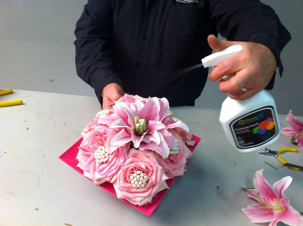 This arrangement has a short life, so spritz with Floralife Finishing Touch spray to protect and refresh flowers.