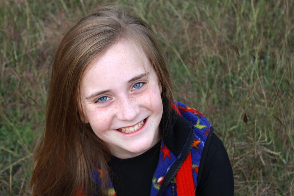 This background is acceptable. The colors compliment the subject and don't distract a viewer's eye.