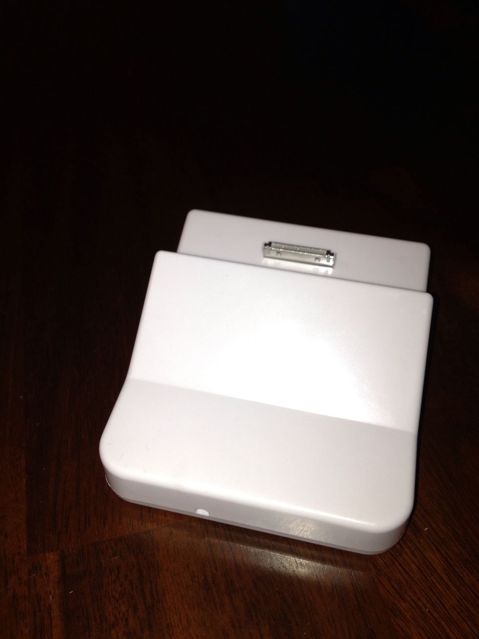 This base/charger was also purchase from a Dollar Tree. It doesn't actually work to charge but makes a sturdy base. Cut the cord off and push what is left of the cord back into the base to hide it.