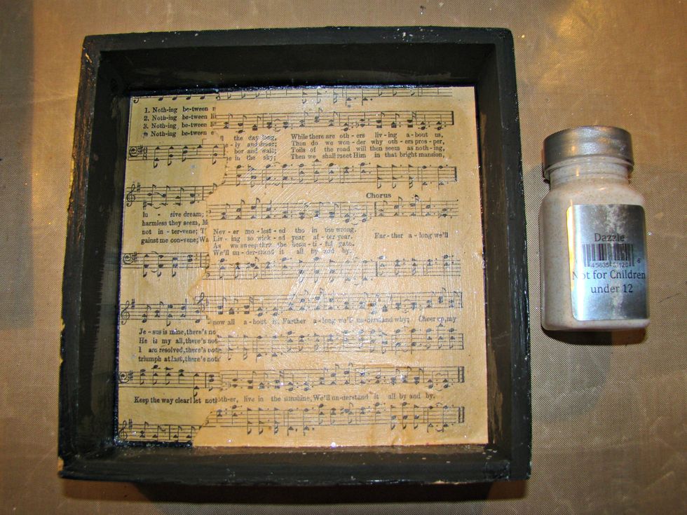 This box I decided to collage music paper, using Sorbet Dazzle it provides a nice seal as well as a glitter of gold to the surface. Apply to the sides of the box as well.