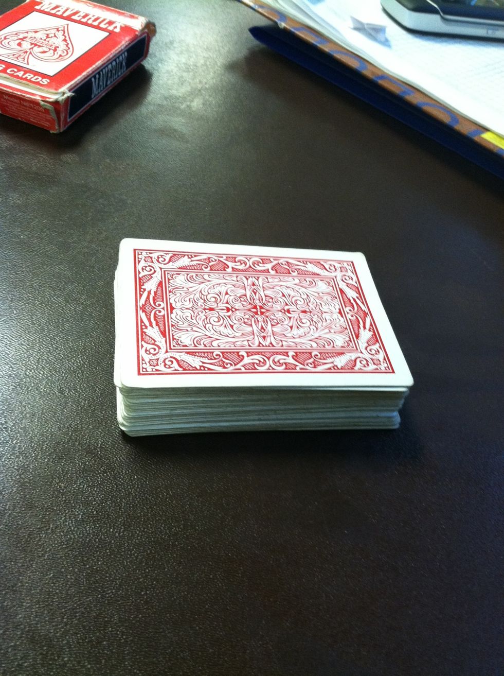 This card trick is really easy. Kind of silly but mainly to show kids. Start with a shuffled deck of cards.