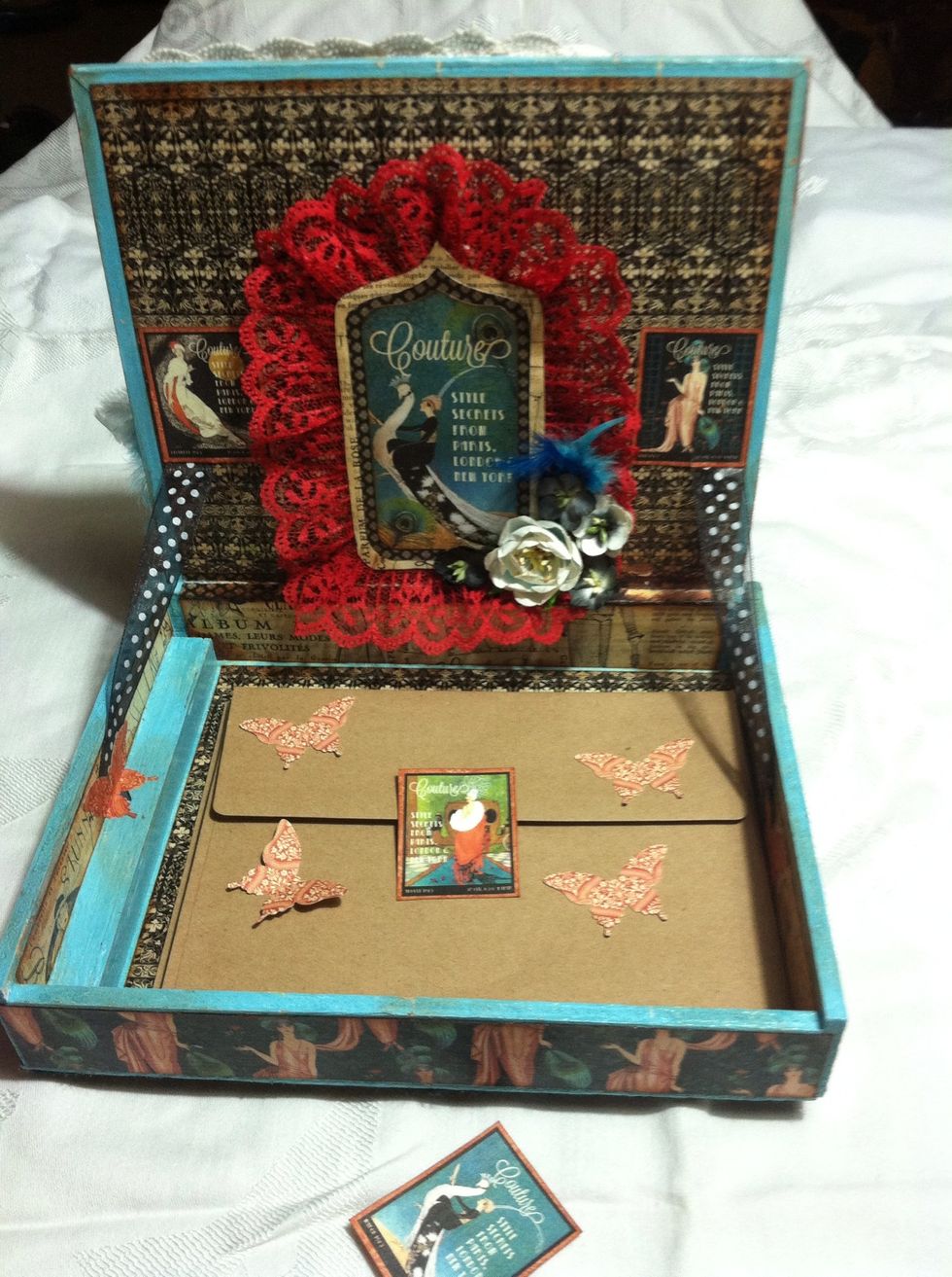 This cigar box now has a new purpose. It can hold 5x7 size envelopes. I imagine I'll eventually make a Mini Album from those envelopes.