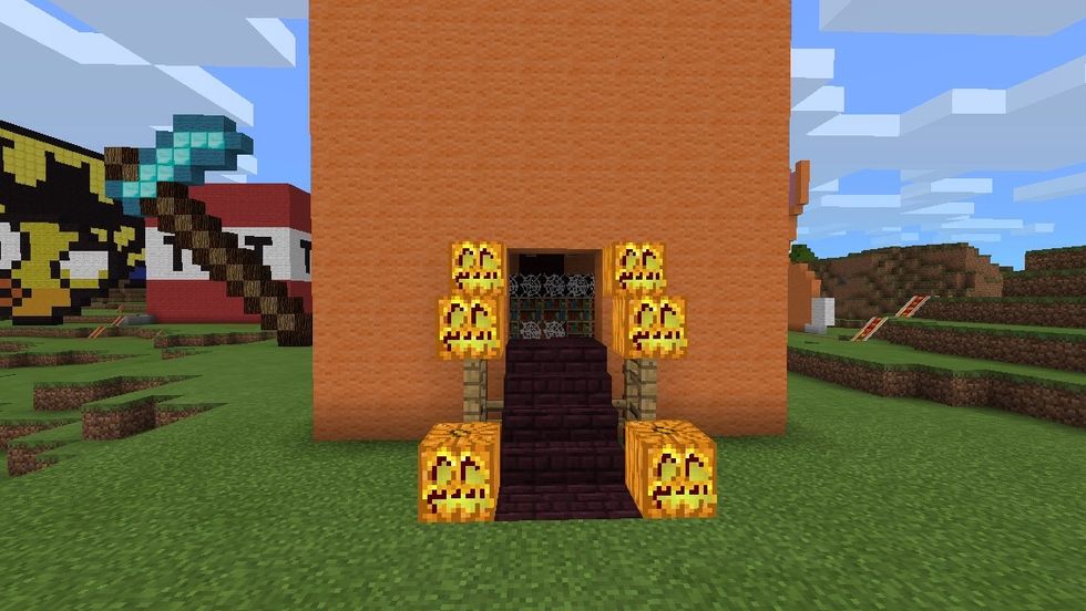 This doorway is usually covered up to make it darker inside once you go in. This is round the back of the pumpkin, so the mouth is ruined.