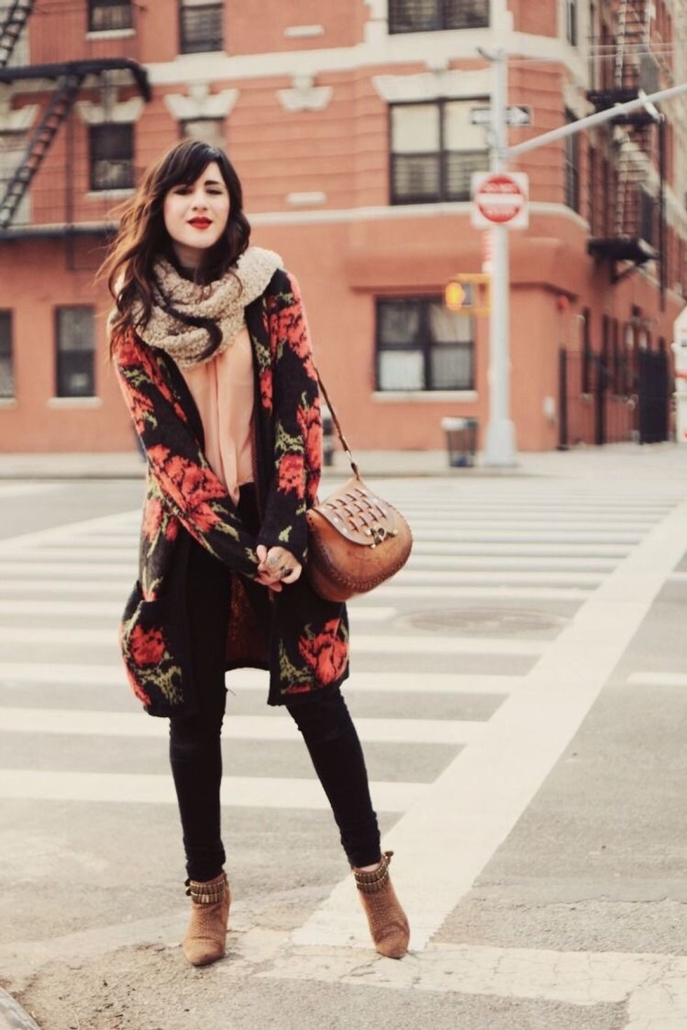 This floral printed half long jacket with cute orange tee with skinny black pant!
