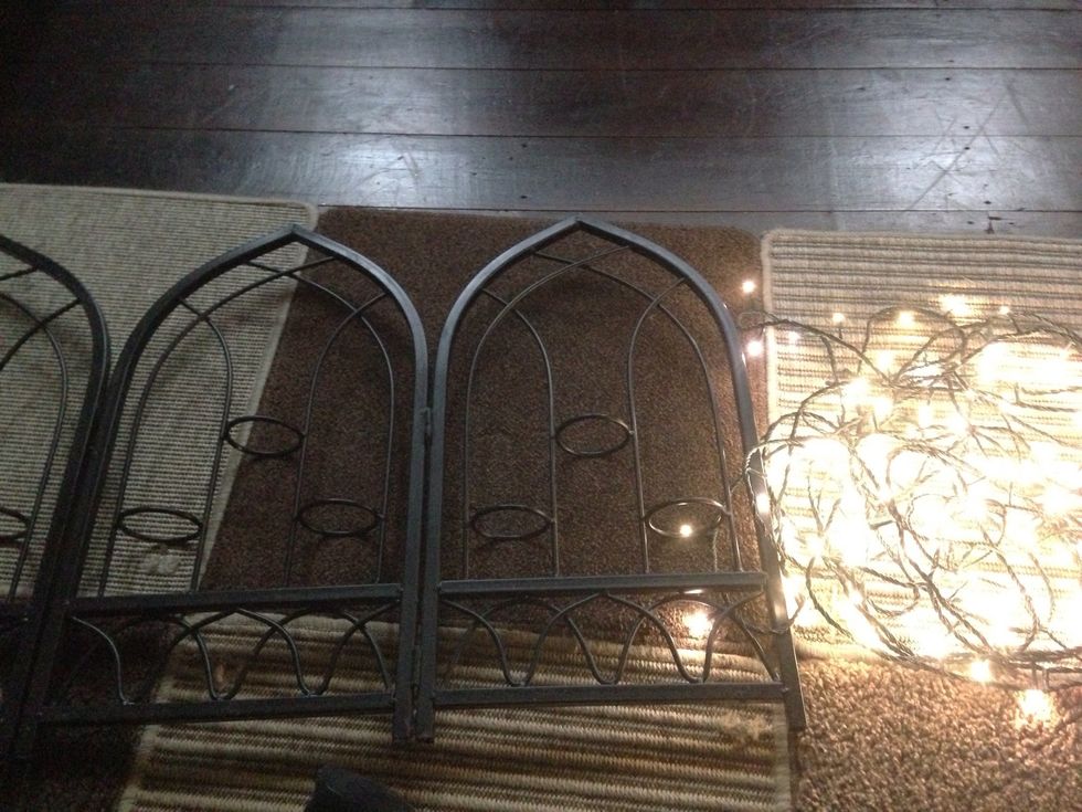 This frame used to house glass tea light holders and opens up into three sections. I'm leaving the holders on the frame for now, I might want to use it for candles again at some point.