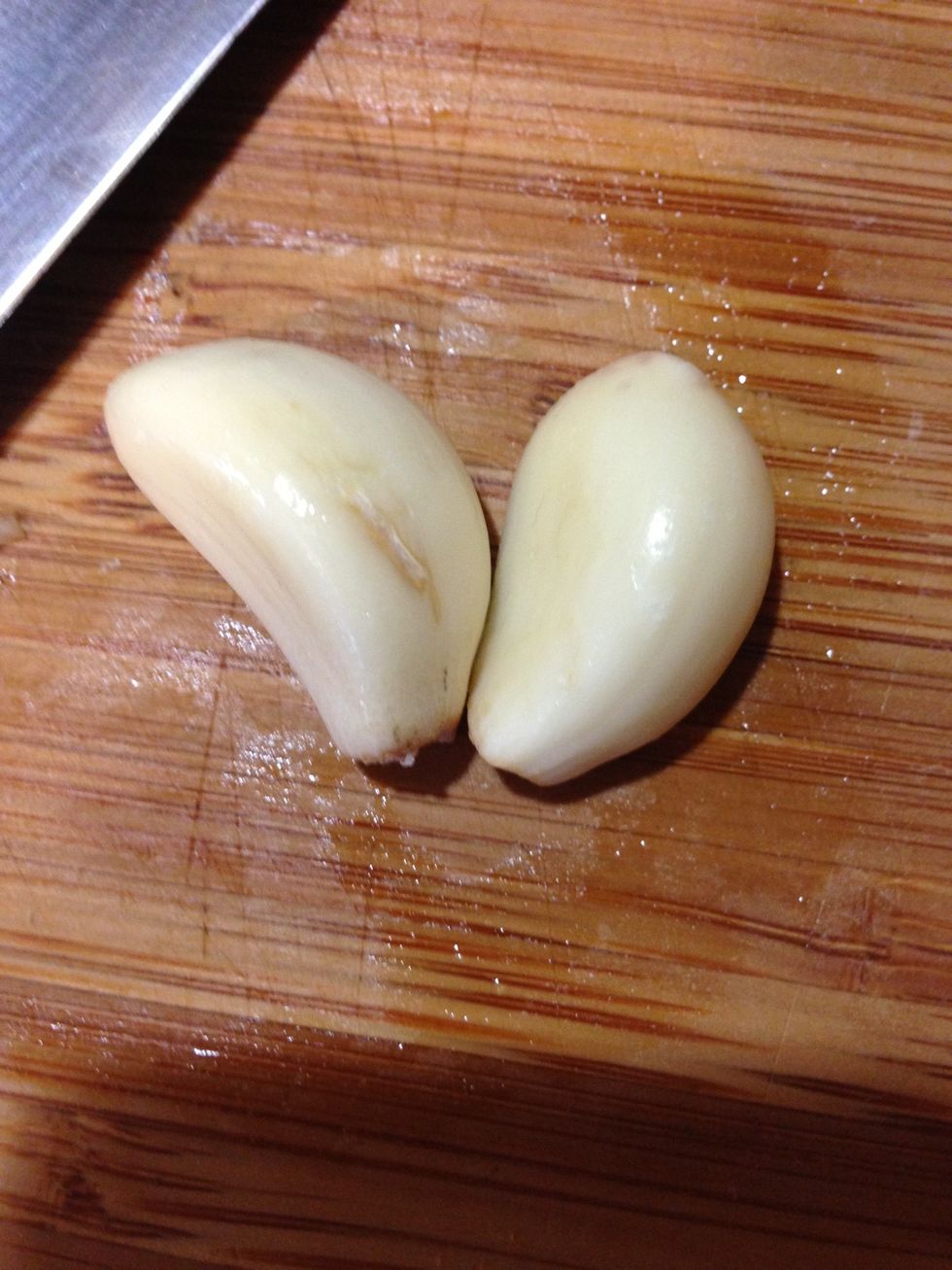 This garlic can be purchased in bulk quantity from the Asian market already peeled and very convenient to use. Otherwise use whatever garlic you have or some garlic powder works fine.