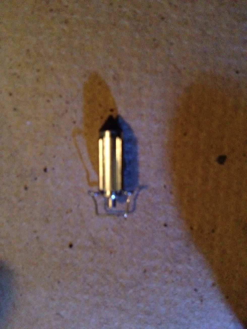 This guy will be attached to the float. Not sure what it's called. It comes off pretty easily. Remove the old one and attach the new one. Put the float and pin back in