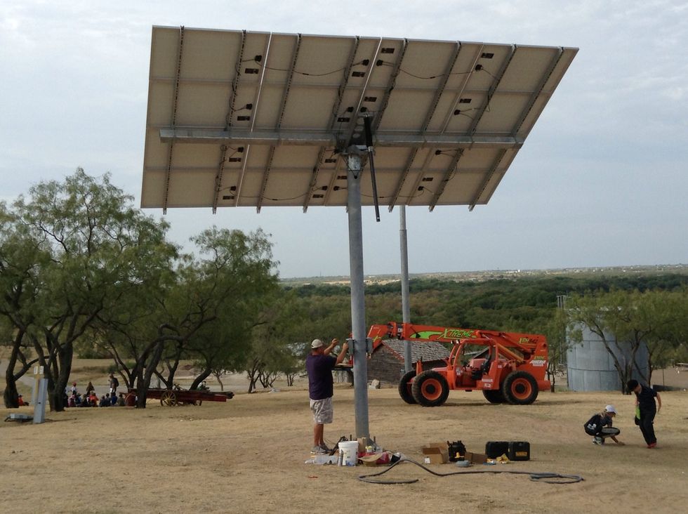 This helps us by .... a panel designed to absorb the sun's rays as a source of energy for generating electricity or heating.