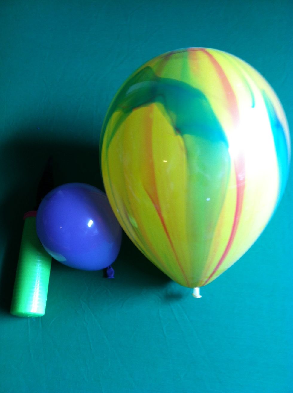This is a 5" balloon and an 11" balloon