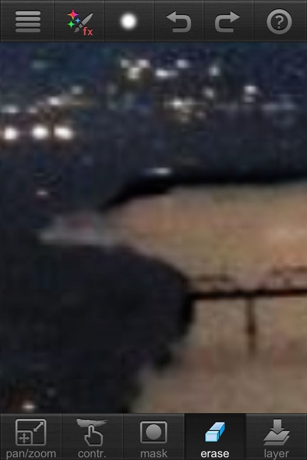 This is a bad picture but you can see how it's darker on the tree line and I don't want that so I carefully erased it.