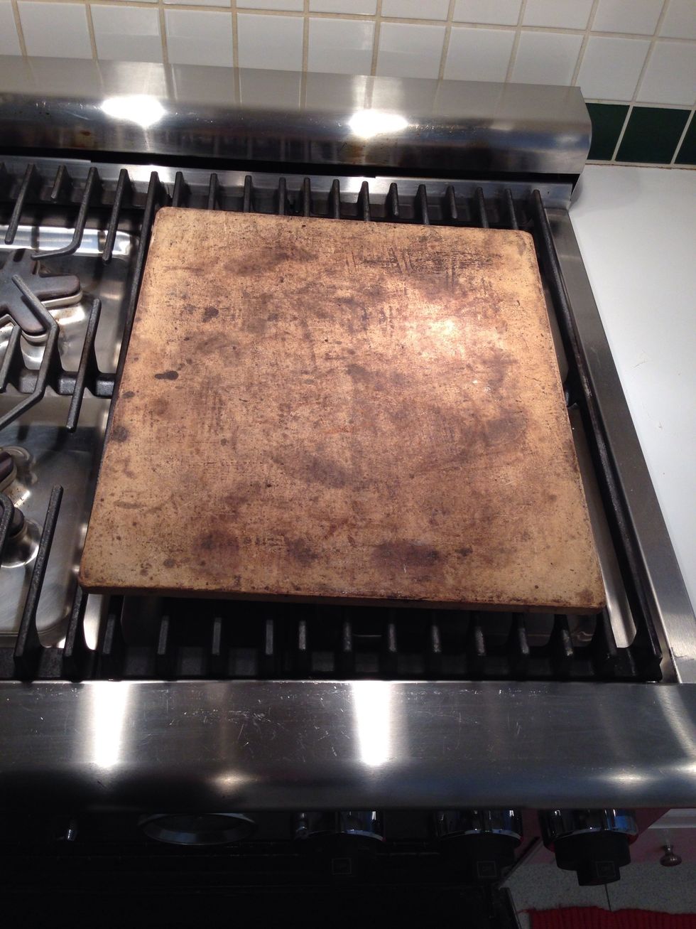 This is a baking stone. If you want bread with a perfect crust, you have to have one. So, get one, put it in the lower third of your oven and set it to 500 degrees. The last rise takes about as