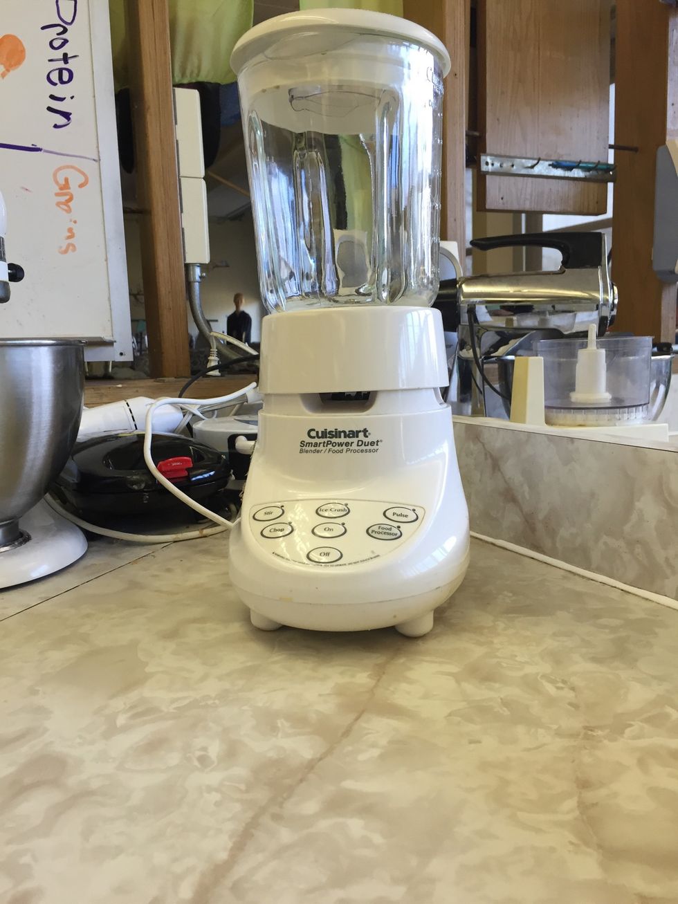 This is a blender it is used to blend foods together to make juices. I can blend foods together using a blender.