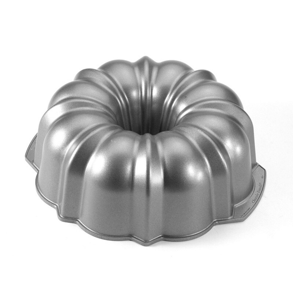 This is a bunt pan it is a cake pan that insures that deep cakes bake evenly