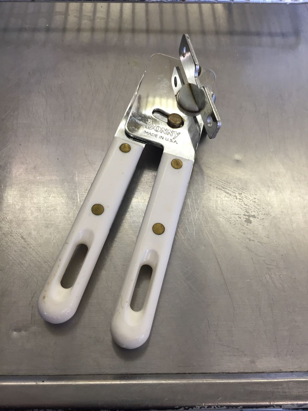 This is a can opener it can be used to open cans. I can use a can opener to open cans.