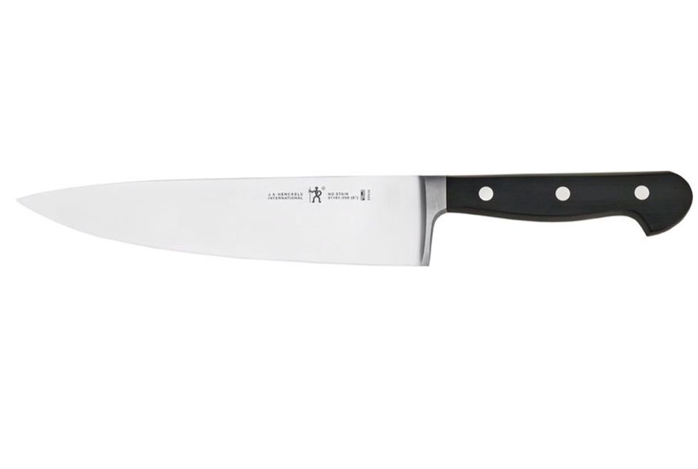 This is a chefs knife. It is used for many different tasks but mostly mincing or cutting vegetables. I can use a chef knife to cut a cucumber.
