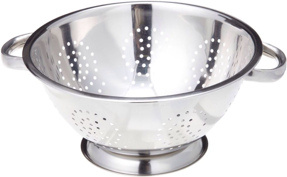 This is a colander. It is used to drain out the water leaving the food in it. I can use colander to drain the water out of the bowl with noodles in it.