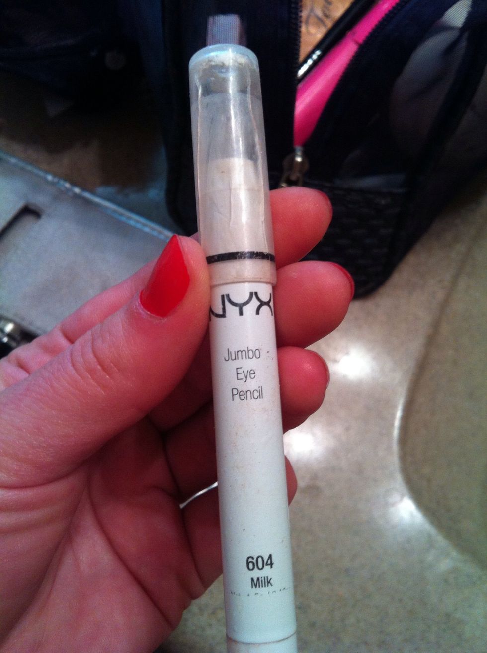 This is a completely optional step but this is just a beauty secret I have found. If you apply this white eye pencil across your lid the eye shadow colors will become very vibrant.