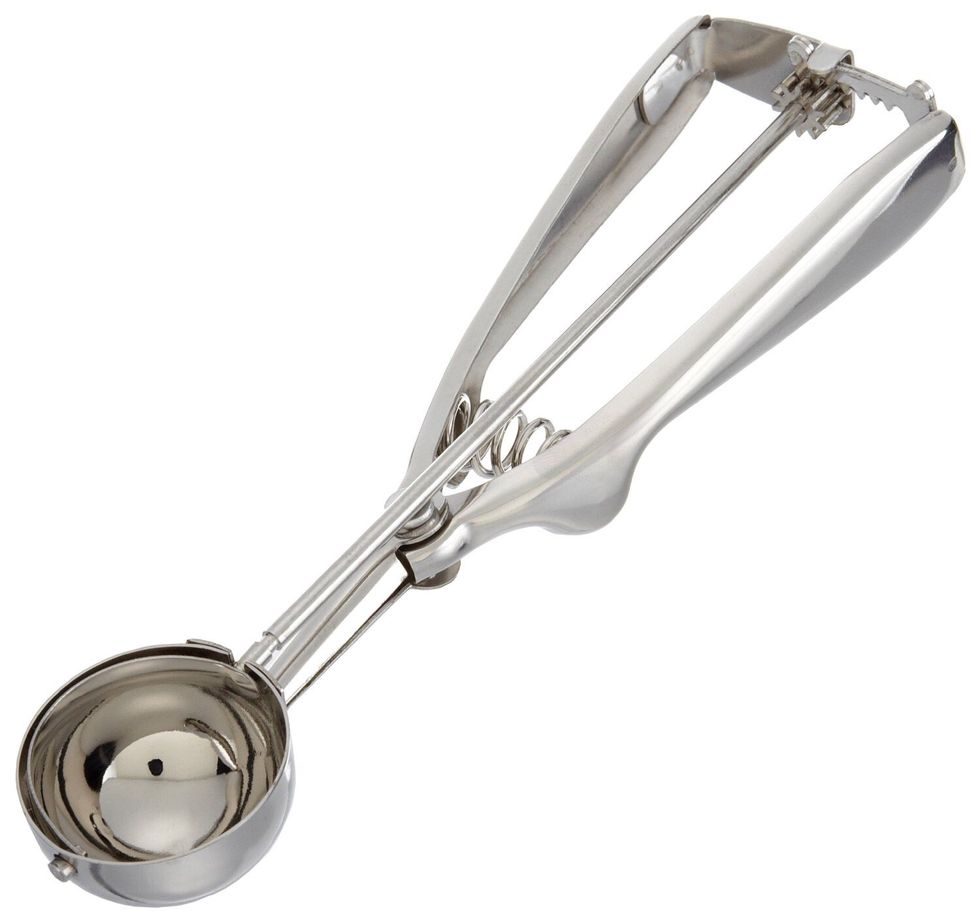 This is a cookie scooper it is used for scooping cookie dough