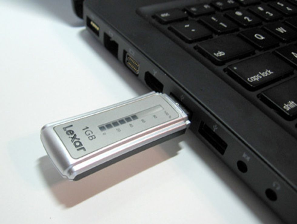 This Is A Flash Drive (USB Stick) And It Plugs In to A USB Ports On Your PC.